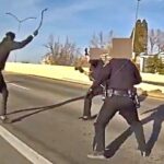 Suspect Lunges at Reno Officers With Tow Chain Before Being Shot