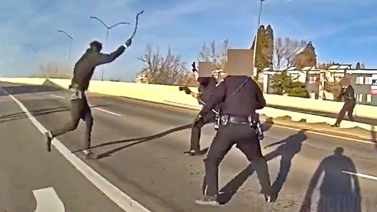 Suspect Lunges at Reno Officers With Tow Chain Before Being Shot