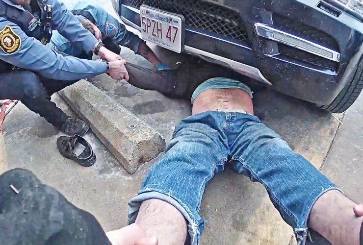 Bodycam Shows Rescue of Man Trapped Under Car Outside Auto Parts Store