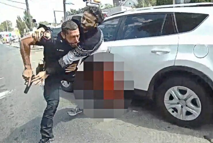 Suspect Goes For Officer's Gun After Being Struck During Shootout