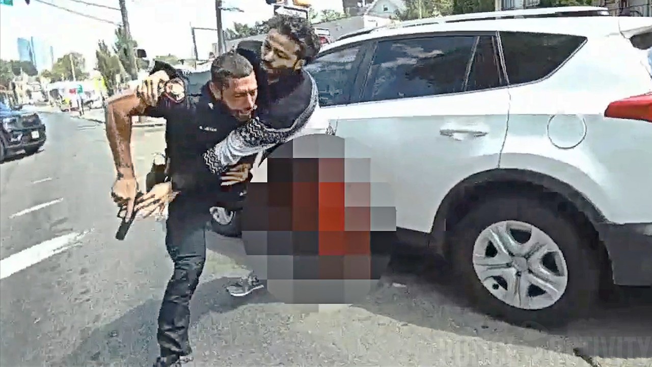 Suspect Goes For Officer's Gun After Being Struck During Shootout