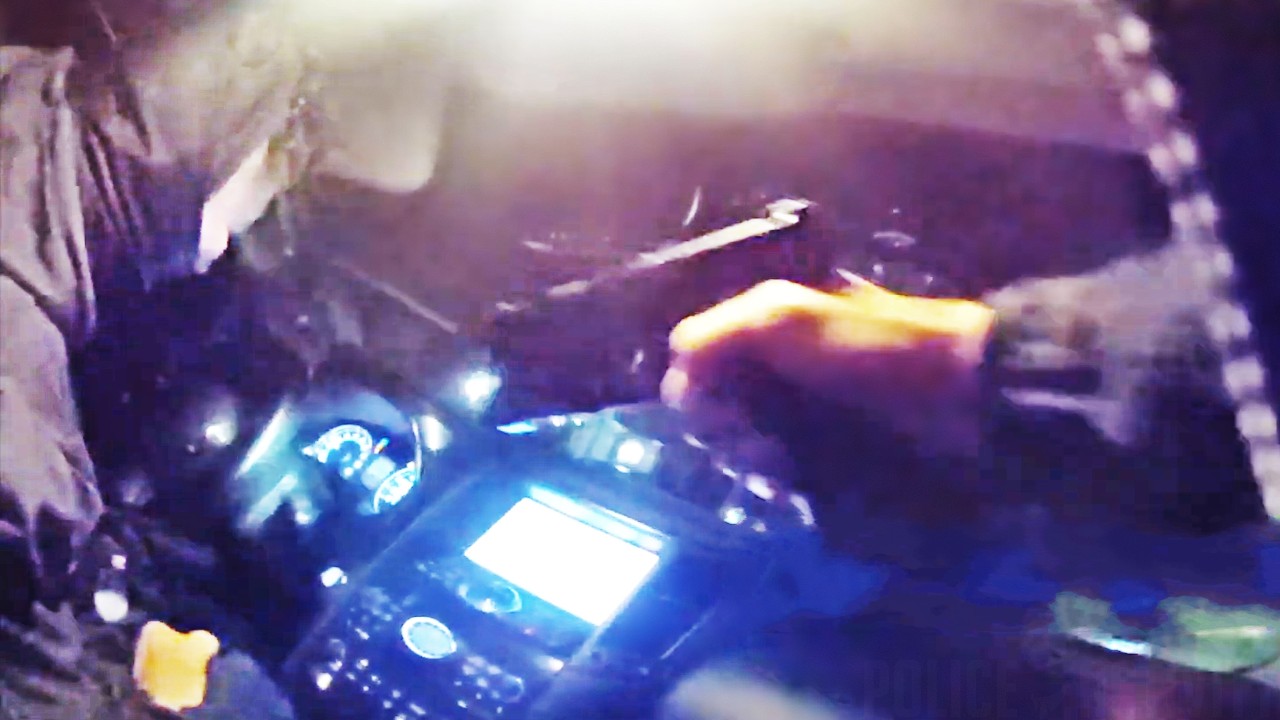 Cop Trapped in Fleeing Getaway Car Shoots Driver