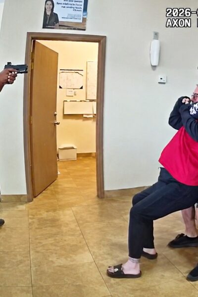 Officer Opens Fire As Suspect Takes Woman Hostage