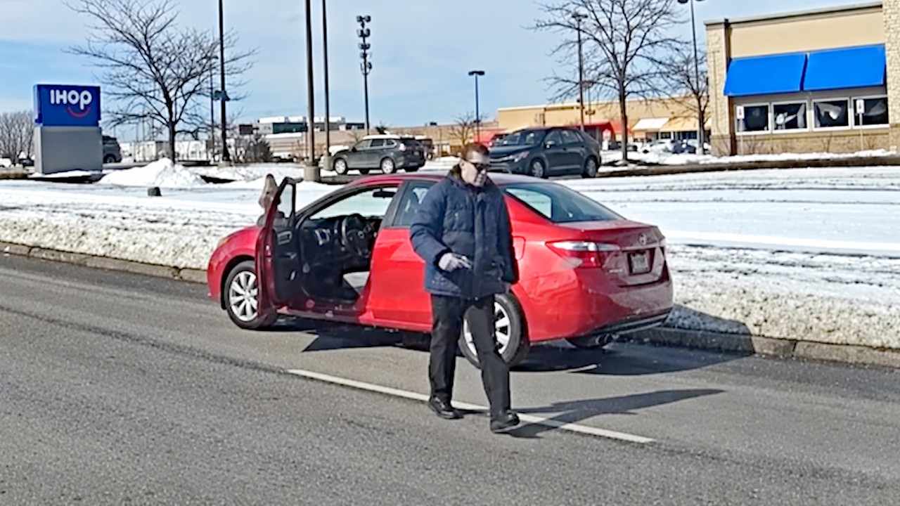 Officers Fire After Man Exits Car Holding a Gun