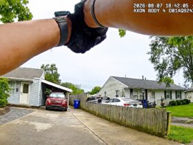 Armed Man Points Two Guns at Police Before Shootout Erupts