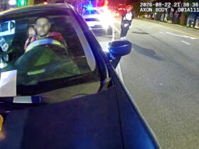 Baltimore Officer Shoots Driver After Being Carried On Hood