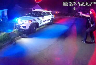 Suspect Steals Police Car Then Crashes Through a House