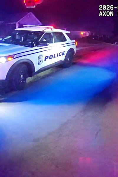 Suspect Steals Police Car Then Crashes Through a House
