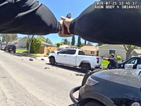 Suspect Crashes into Police Motorcycle Before Officers Open Fire