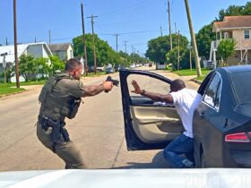 Officer Fires Eight Shots After Struggle With Driver