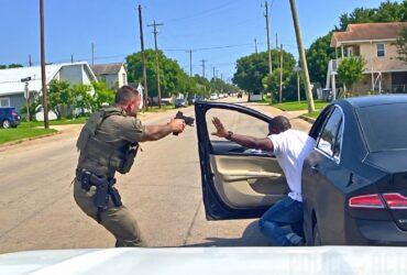 Officer Fires Eight Shots After Struggle With Driver