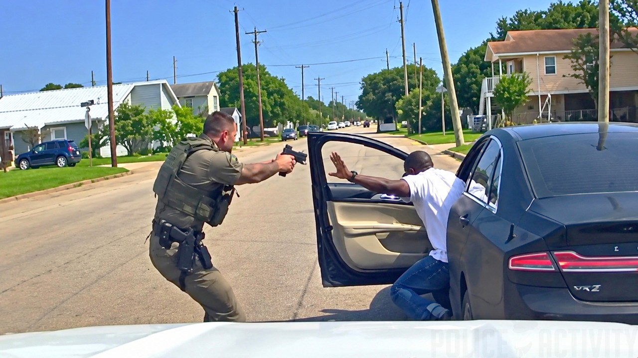 Officer Fires Eight Shots After Struggle With Driver